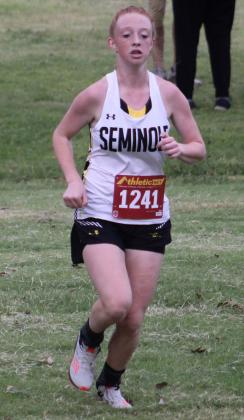 Seminole’s Addison Armstrong runs to the finish line at the TR1BE Cross Country Invitational on Saturday at Gaines CountyPark.ArmstrongfinishedsecondtohelptheMaidens with the team title. (Sentinel photo/Lee Scheide)